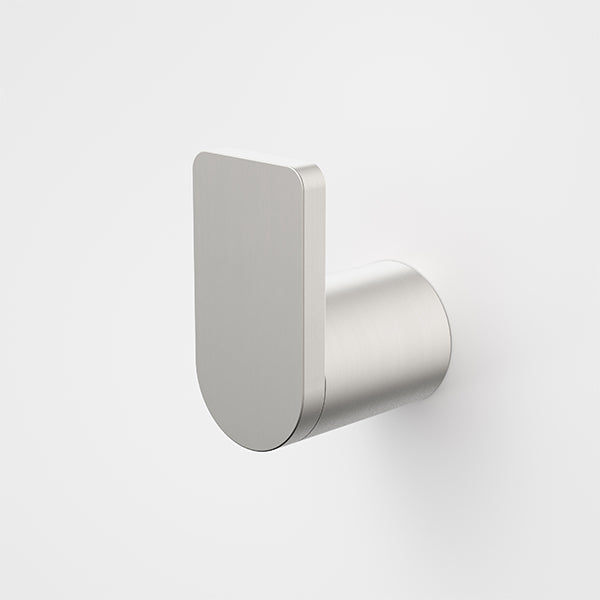 Caroma Urbane II robe hook in brushed nickel, minimalist wall-mounted bathroom accessory on white background