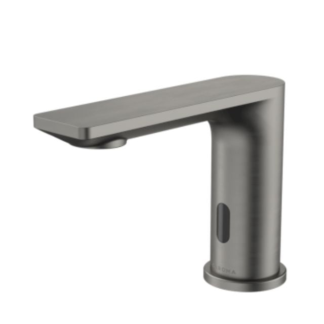 Caroma Urbane II gunmetal sensor basin spout, hob mounted with slim rectangular outlet and cylindrical base, side view