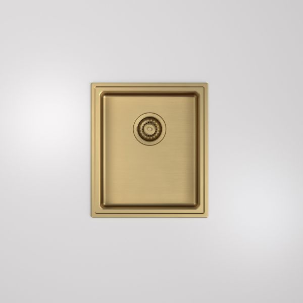 Caroma Urbane II single kitchen sink in brushed brass, single bowl, top view, with central waste opening