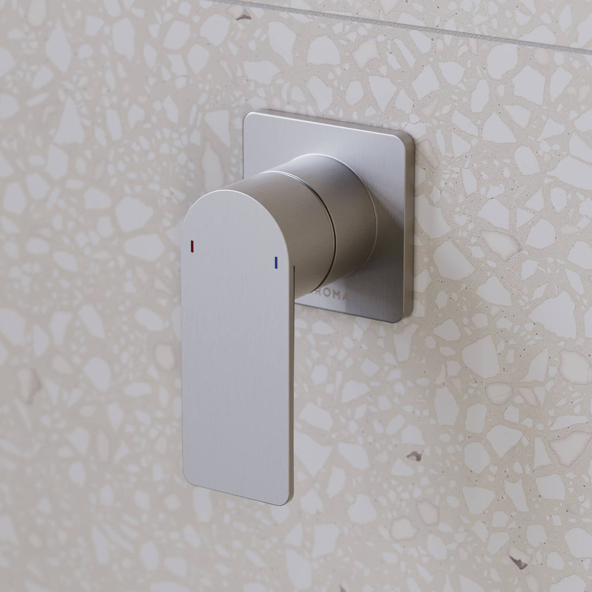 Caroma Urbane II square wall-mounted bath/shower mixer in brushed nickel on terrazzo-look bathroom tile