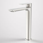 Caroma Urbane II tall basin mixer tap in brushed nickel, shown on a white background with slim rectangular spout and lever handle
