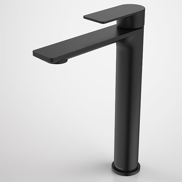 Caroma Urbane II tower basin mixer in matte black, shown in angled side view with slim lever handle and tall round body
