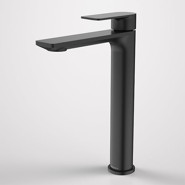 Caroma Urbane II tower basin mixer in matte black, with tall cylindrical body and slim flat spout on white background