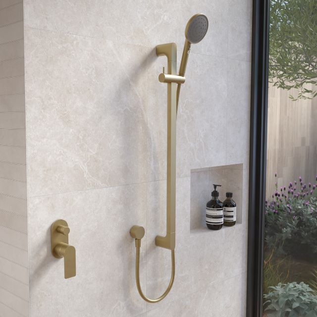 Caroma Urbane II universal rail shower in brushed nickel, wall-mounted with hand shower and hose in a modern bathroom