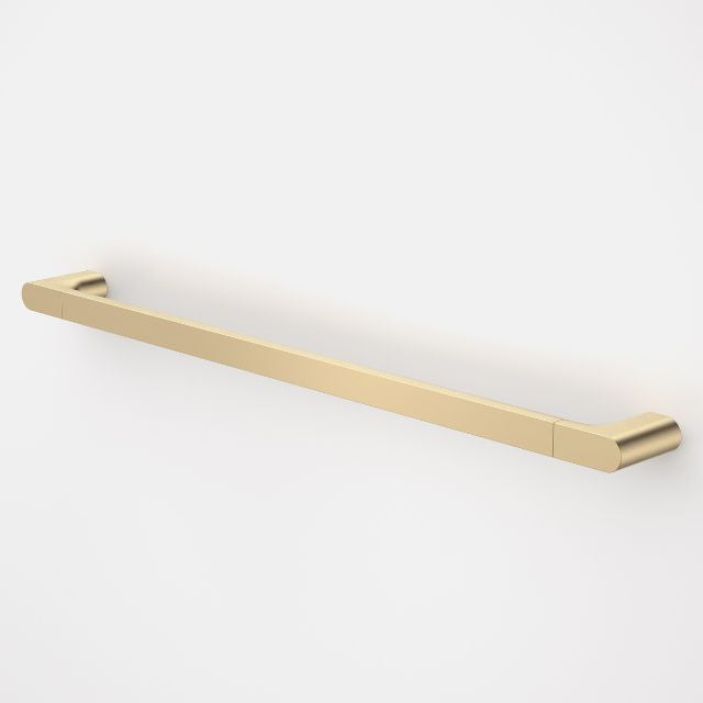 Caroma Urbane II straight grab rail in brushed brass, 800mm, with concealed wall fixings on white background