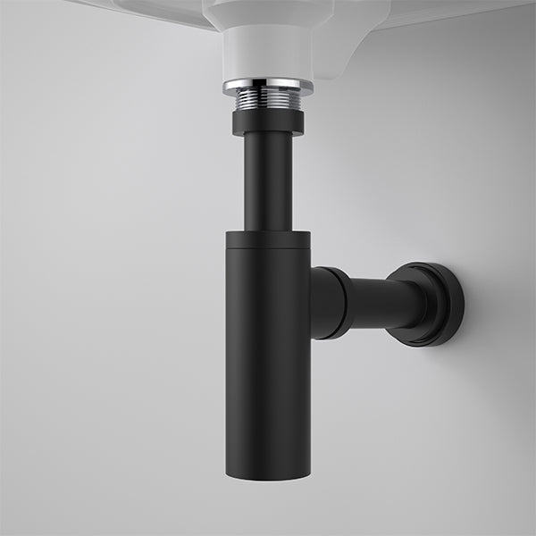 Caroma Urbane II matte black bottle trap under wall-hung basin, round brass waste trap with 40mm connection