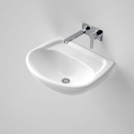 Caroma white wall-hung basin with wall-mounted mixer, arch shape and chrome waste, angled front view