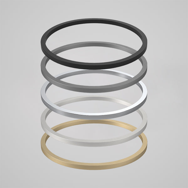 Caroma Liano II round above counter basin dress rings in mixed finishes, including matte black, grey, silver and brushed brass