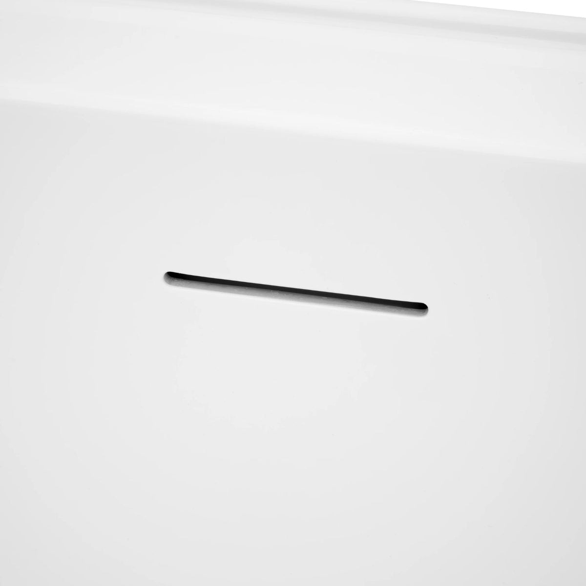 Close-up of white Decina Aria freestanding bath with integrated overflow slot and glossy acrylic finish