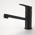 Dorf Kip black sink mixer tap with swivel spout, side view on white background