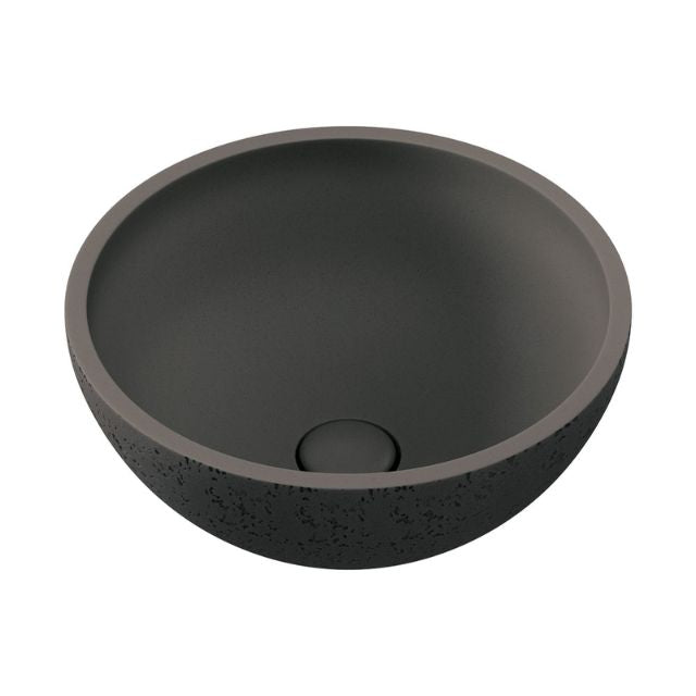 Fienza Alba round above counter basin in Warm Grey concrete, with smooth matt bowl and speckled outer finish