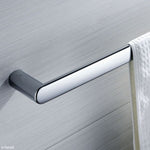 Fienza Empire chrome single towel rail mounted on a bathroom wall with towel hanging over the end