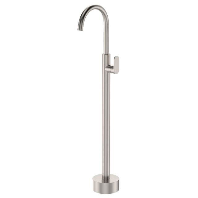 Fienza Empire Slim floor-mounted bath mixer in brushed nickel, tall slim swivel tap with round base and curved spout on white background