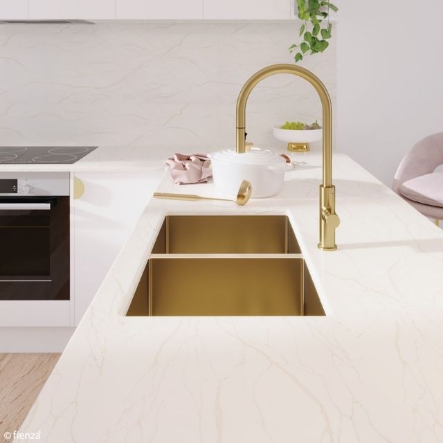 Fienza Hana double bowl kitchen sink in rugged brass, undermount in white benchtop, with gold gooseneck mixer tap
