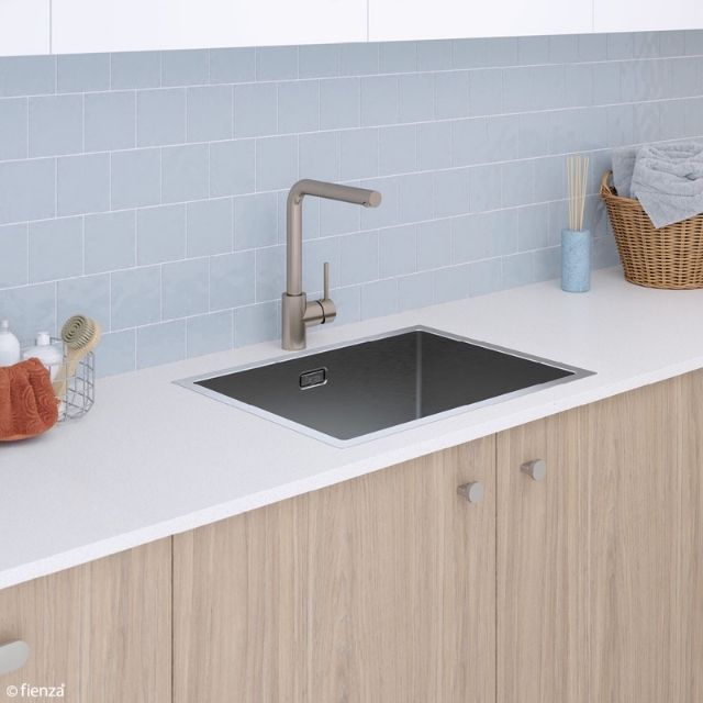 Fienza Hana stainless steel laundry sink, topmount in white benchtop with mixer tap in modern laundry scene