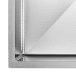 Fienza Hana stainless steel single bowl sink close-up showing corner and textured base, 550x450mm close-up