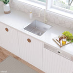 Fienza Hana stainless steel single bowl kitchen sink in a white benchtop, topmount view with mixer tap and drainer tray
