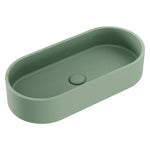 Fienza Jada sage concrete above-counter oval pill basin with no overflow, shown in angled view on white background