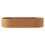 Fienza Jada concrete above counter basin, oval pill shape in Tuscan finish, side view on white background