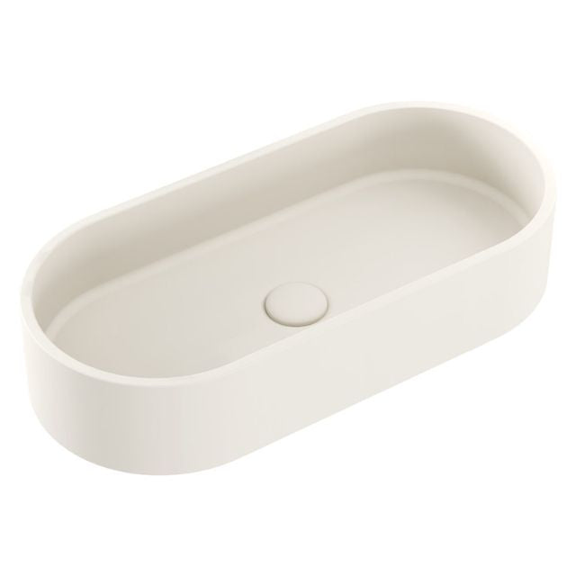 Fienza Jada oval above-counter basin in Warm White concrete, with centred waste, shown on white background