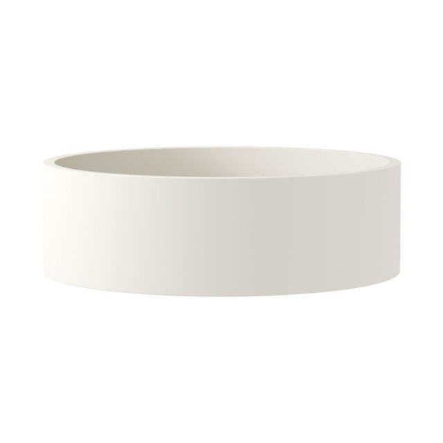 Fienza Jada round above counter basin in warm white concrete, shown from the side on a white background