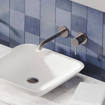Fienza Kaya wall basin mixer set in brushed nickel with round plates and curved outlet above a white basin