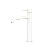 Fienza Kaya medium basin mixer in matte white, side view, with curved spout and pin lever handle