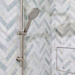 Fienza Kaya rail shower in brushed nickel, shown installed against patterned bathroom tiles