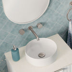 Fienza Kaya round wall basin/bath tap set in brushed nickel above a white vessel basin, with matching wall handles and spout