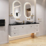 Lifestyle bathroom vanity with Fienza Kaya soap shelf in urban brass on wall beside oval mirror and basin.
