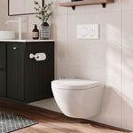 Fienza Koko wall hung toilet suite in gloss white, shown in a modern bathroom with wall cistern and soft-close seat
