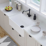 Fienza Olivia gloss white butler kitchen sink with fluted front in a light, modern kitchen bench setting
