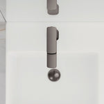 Fienza Tono basin mixer in gun metal, hob mounted above a white basin, shown front on with round waste outlet visible