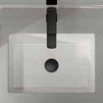 Fienza Tono matte black basin mixer installed over a white square basin, top view, showing the flat square spout and mixer lever.
