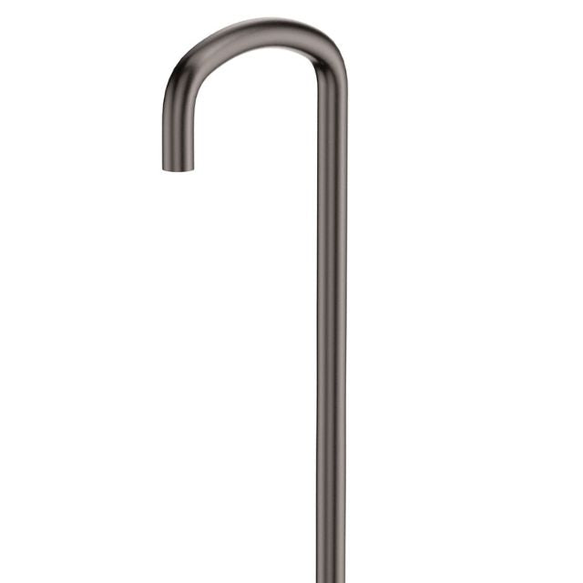 Fienza Tono floor-mounted bath outlet in gunmetal, tall fixed spout with curved top on white background