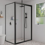 Fienza Tono matte black hand shower on soft square wall bracket, shown installed in a modern shower