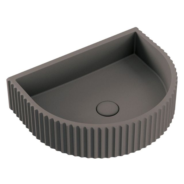 Fienza Valentina fluted arch wall basin in warm grey concrete, front view with no tap hole, 465 x 360mm