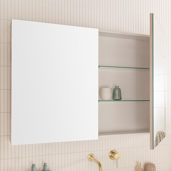 ADP Glacier Lite shaving cabinet, open mirrored door showing glass shelves and white interior above a vanity