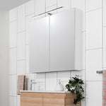 ADP Gloss Silk 2-door shaving cabinet in white, wall-mounted above a vanity with mirror-light in a tiled bathroom