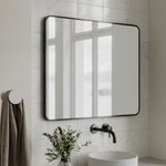 Ingrain rectangular matte black framed bathroom mirror, landscape wall-hung above vanity in tiled room