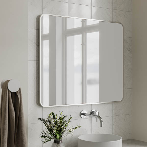 Ingrain rectangular brushed nickel framed bathroom mirror, wall hung in portrait above a vanity