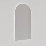 Ingrain frameless arch LED mirror with touch sensor, portrait wall-hung, shown front on in grey setting