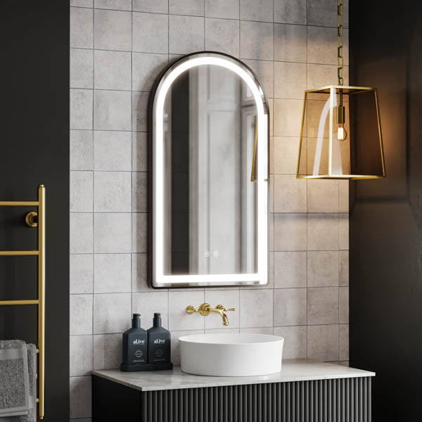 Ingrain arch matte black framed frontlit LED mirror in portrait view, mounted above a vanity in a bathroom setting