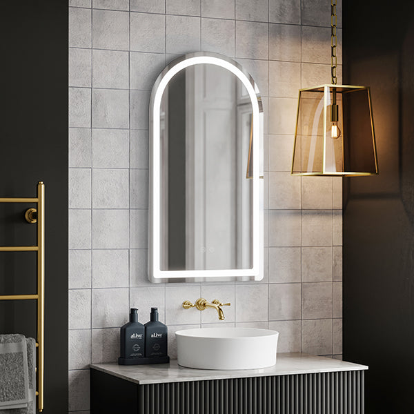 Ingrain arch frameless frontlit LED mirror in white, wall hung above a bathroom vanity and basin