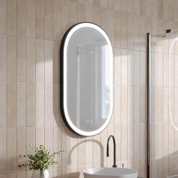 Ingrain pill-shaped matte black framed LED mirror, frontlit oval wall-hung bathroom mirror in portrait view, 500 x 850mm