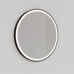 Ingrain round matte black framed frontlit LED mirror, wall hung with illuminated edge on grey wall