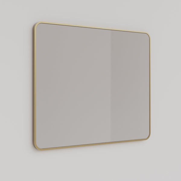 Ingrain rectangular mirror with brushed gold frame above a bathroom vanity, landscape wall-hung view