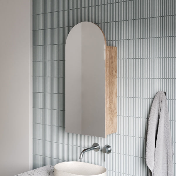 Caroma Liano II matte speckled pill above counter basin with thin rim, shown in a bathroom vanity setting