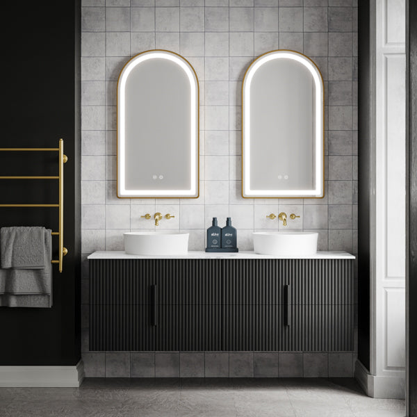 Phoenix Cromford brushed gold wall basin/bath tap set in a double vanity bathroom scene
