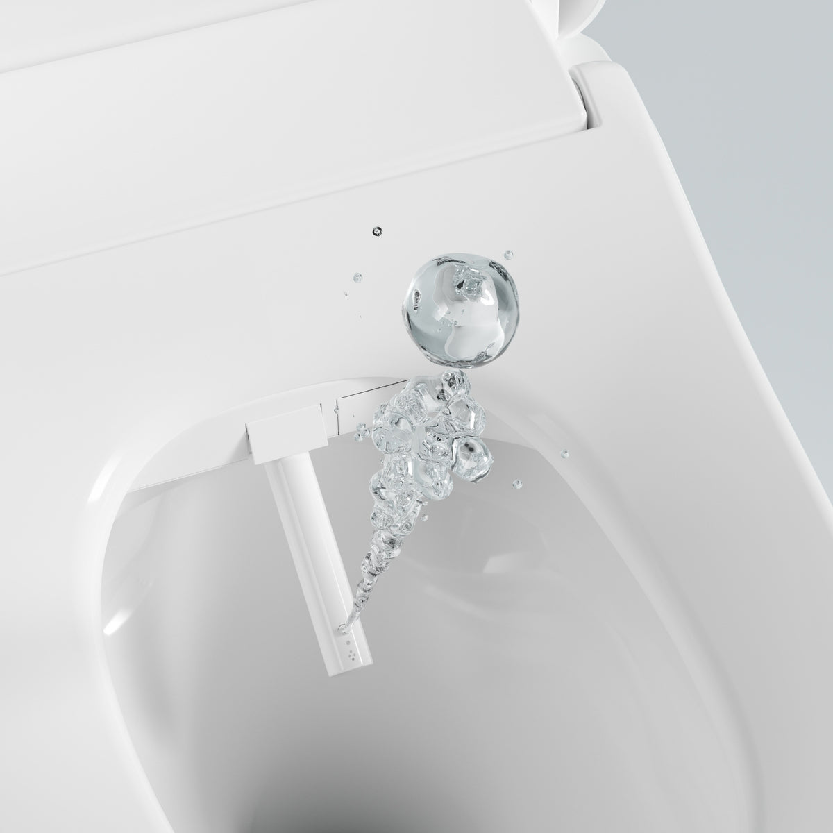 Close-up of a white Lafeme bidet toilet suite bowl with water jet and open rimless pan detail